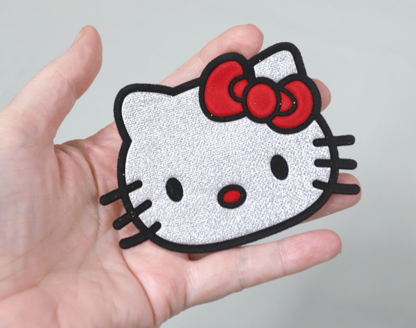 Grand écusson Hello Kitty argenté