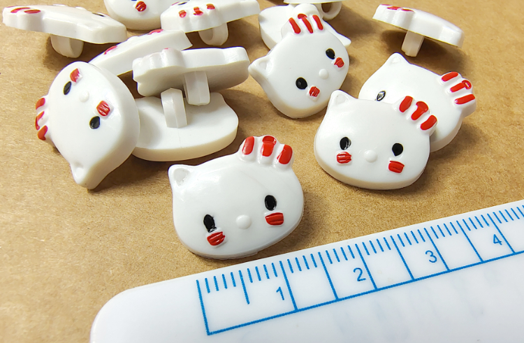 16 boutons Hello Kitty
