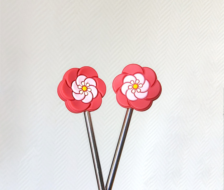 Bouchons fleurs stylisées
