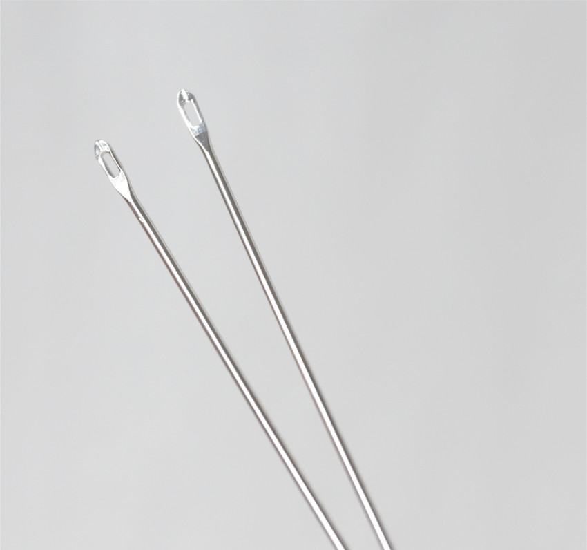 Aiguille double chas